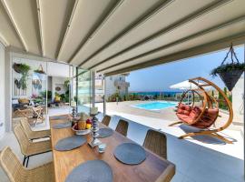 Sea view villa with private pool close to the beach – willa w mieście Karteros