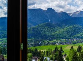 Pokoje i apartament z widokiem na Tatry、コシチェリスコのホテル