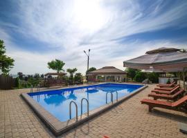 Hotel Paradise, hôtel avec piscine à Soukhoumi