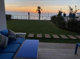Luxery stay with seaview, pool, green space & Sunset orientation near Rabat, apartment in Sidi Bouqnadel