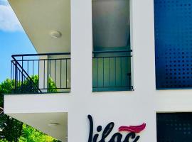 Viesnīca Lilac Apartman pilsētā Balatonlelle, netālu no apskates objekta pludmale Napfény