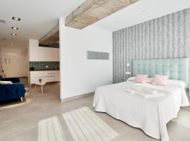 9 NIDOS C&eacute;ntrica Suites - Nuevo，普拉森西亞的住宿