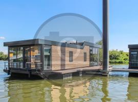 Houseboat Waterlelie, hotel en Ohé en Laak