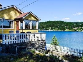 Nice Home In Nordre Frogn With Kitchen, location de vacances à Brevik