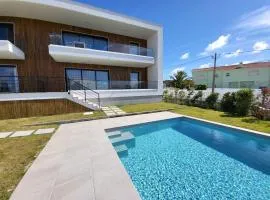 Villa Silver Coast luxe apartment with 3 bedrooms, 2 bathrooms and a beautiful view on the swimmingpool in a cosy Coastvillage between the famous surfplaces Peniche and Nazare