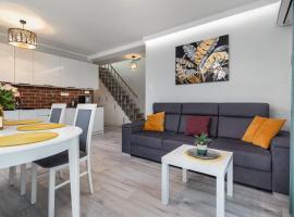 Apartamenty Wczasowa by Noclegi Renters, hotel in Międzywodzie