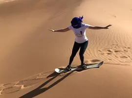 Erg Lihoudi Luxury desert camp with Camel ride, meals & sandboarding