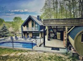 Wzgórza Kunowskie - domy na wynajem z basenem, baliami i saunami – dom wakacyjny w mieście Bodzentyn