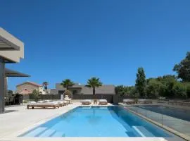 Athina Luxury Villa, with Pool & Walk to the Beach, By ThinkVilla