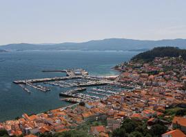 Casa en Muros con preciosas vistas al mar, hotel a Muros