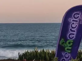 PÉ NA AREIA