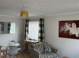 The Cwtch - a self contained one bedroom annex, hotel din Pwllheli