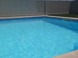 bel appart terasse vue panoramique avec piscine, apartment in Ariana