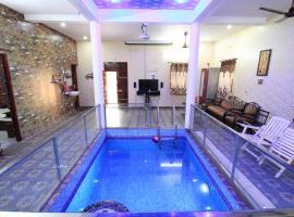 Orange Orchid 6BHK Private Pool Villa, hotel with parking in Marakkānam