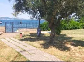 Independent villa with private beach on the lake