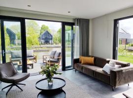 Luxurious detached water villa with jetty, feriehus i Balk