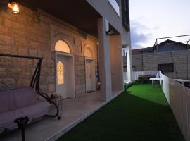 White view โรงแรมในMas'ade