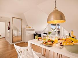 Ferien-Apartment Haubentaucher - mit priv Strandzugang, Hotel in Friedrichshafen