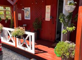 Tiny House Marielyst, casa de campo em Bøtø By