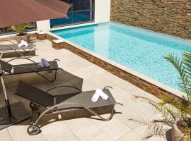 Lagrange Vacances Les Patios Eugénie, apartament cu servicii hoteliere din Biarritz