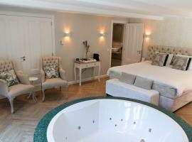 Guesthouse "Mirabelle" met indoor jacuzzi, sauna & airco، فندق في تيلبورغ