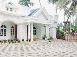 Jinan palace guest house Jinan palace guest house, hotel barat a Nedumbassery