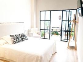 loft con mucho encanto cerca de Sevilla, ξενοδοχείο σε Alcala de Guadaira