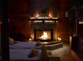 Mini spa in chalet bosco, resort i Cisternino