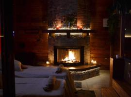 Mini spa in chalet bosco e trullo, cabin nghỉ dưỡng ở Cisternino