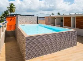 Evasion en plein cœur de la ville Studio Jacuzzis Sauna et piscine au centre de Port-Louis
