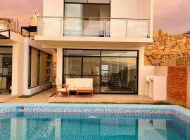 VISTA LINDA BUNGALOW para 10 personas Punta Veleros、ロス・オルガノスのバンガロー
