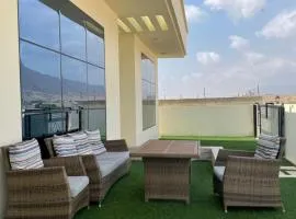 Taqah Hills; طاقة هيلز