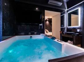 4 Suites " unconventional living rooms ", hotel with jacuzzis in Catania