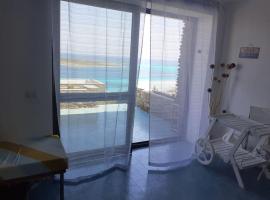 Casa Capo Falcone - Terraced house with wonderful sea view -, בית נופש בסטינטינו