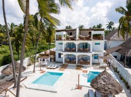 Coco Rise Villas - by Hostly, cabaña en Bwejuu