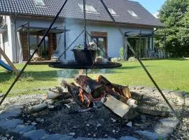 Dom uKromki z kominkiem i widokiem na Śnieżkę