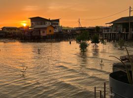 吉胆岛 潮汐民宿 Pulau Ketam Tide Homestay, chal&eacute; alpino em Bagan Teochew