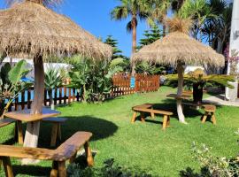 Hostal Casa Arco Iris (Playa), albergue en Los Caños de Meca