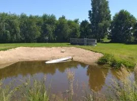 Domek letniskowy na Mazurach nad stawem