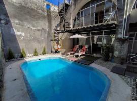 Casa con alberca dentro de ex-hacienda en Atlixco โรงแรมในอัทลิซโก