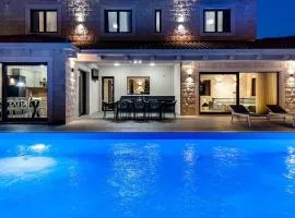 NEW! Stylish Villa Neven with 44sqm heated private pool, 4 en-suite bedrooms, 2 living and dining areas, wine cellar