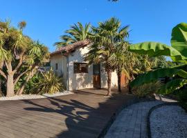 Guest House au milieu des palmiers, casa de hóspedes em Saint-Martin-de-Seignanx