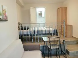 Marina's Apartments - White & Stone Apartment