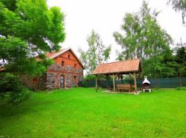 Mazurski Ogród - dom z ogrodem, kominkiem i wiatą biesiadną, beach rental in Wydminy