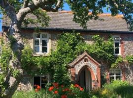 Stone Cottage: Thornage şehrinde bir plaj oteli