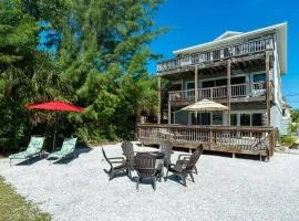 You can't get closer to the beach than this beachy 3 bedroom condo