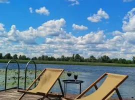 Дом в лесу на берегу Днепра для отдыха с купелью на дровах, аппартоменты