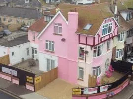 PINK HOUSE ,Opposite PIER & Beach ,SLEEPS 6 , 2 BEDROOM GROUND FLOOR SELF CONTAINED GARDEN FLAT , PRIVATE ENTRANCE , KITCHEN , Guaranteed Parking ,Wifi , Movies ,Bathroom ,fridge , microwave ,BEDROOM 1, DOUBLE BED & 2 SINGLE BEDS ,BEDROOM 2 , DOUBLE BED
