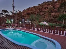 Pousada Jardim do Buda com café e piscina