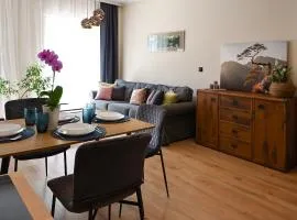 Praktyczny apartament z cichym tarasem